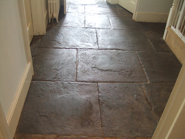 Flagstone floor cleaned and polished