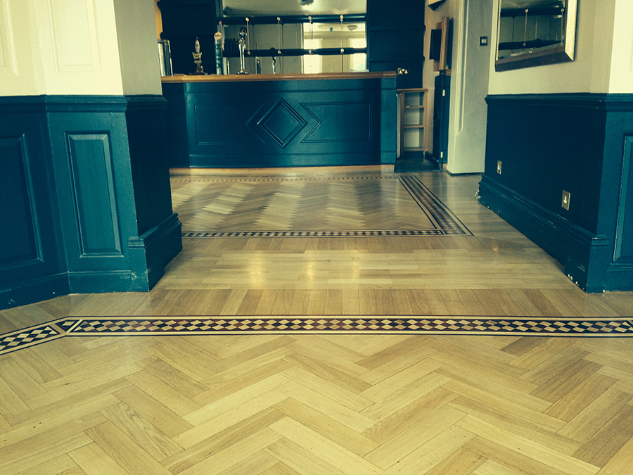 Parquet floor sanded and lacquered.