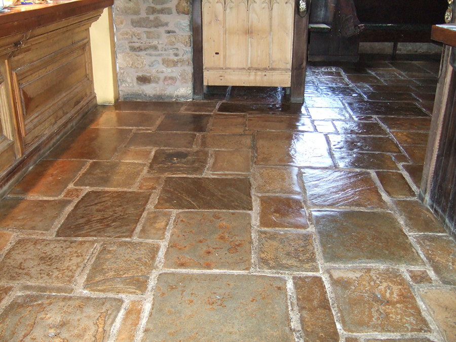 Restored flood damaged flagstone floor