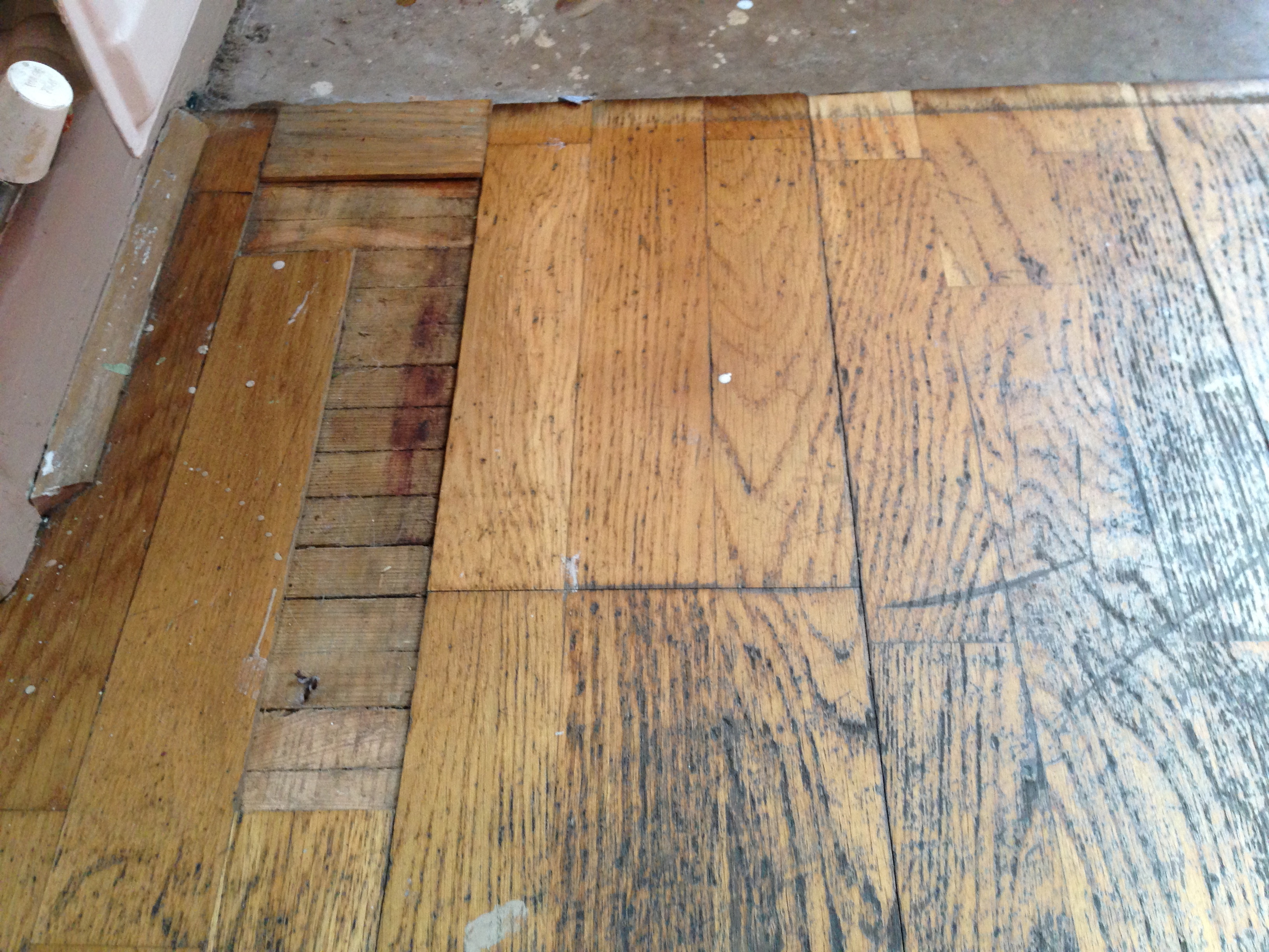 Oak laminate floor with missing laminate wood strips