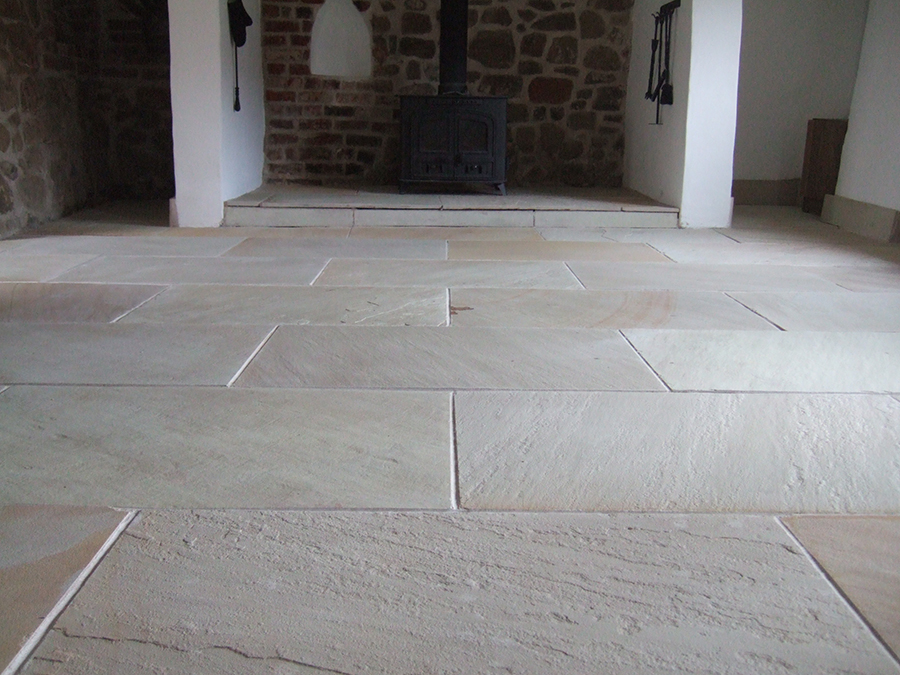 Flagstone floor in a barn with natural colours 