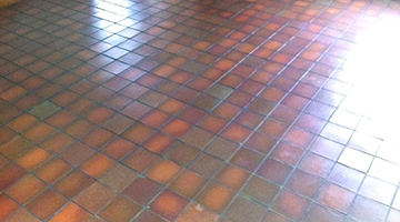 Quarry-tiled floor in a dining room cleaned and sealed