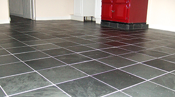 Slate floor tiles restored in a kitchen