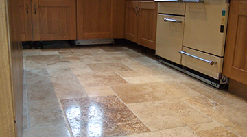 Travertine floor in kitchen polished.