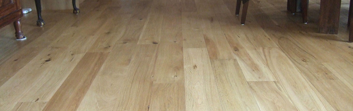 Oak floorboards in a kitchen sanded and lacquered