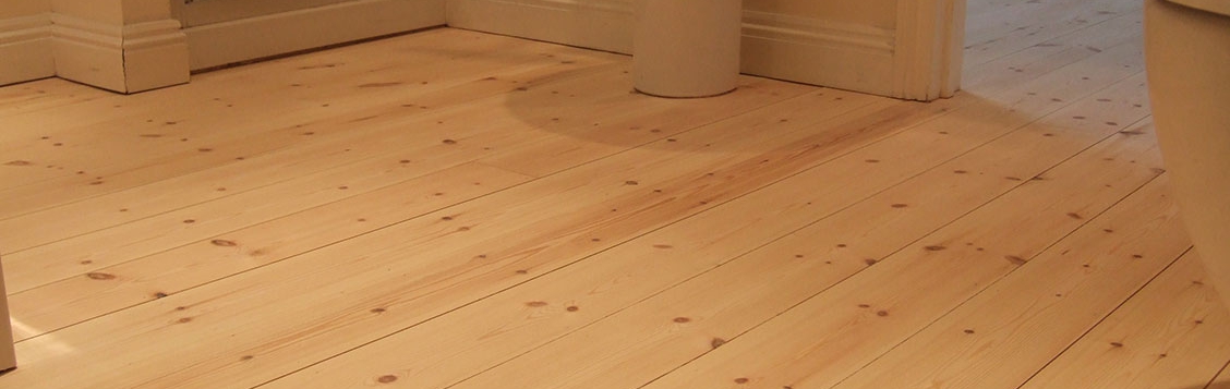 New pine floorboards stained