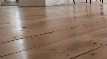 Victorian pine floor in a kitchen sanded and lacquered.