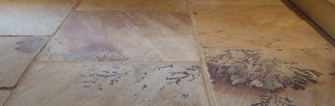 Pyrolusite stone floor restored