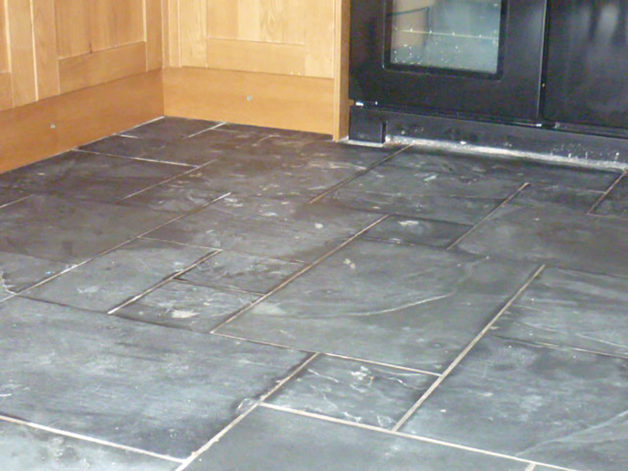Black slate tiles with failed grout
