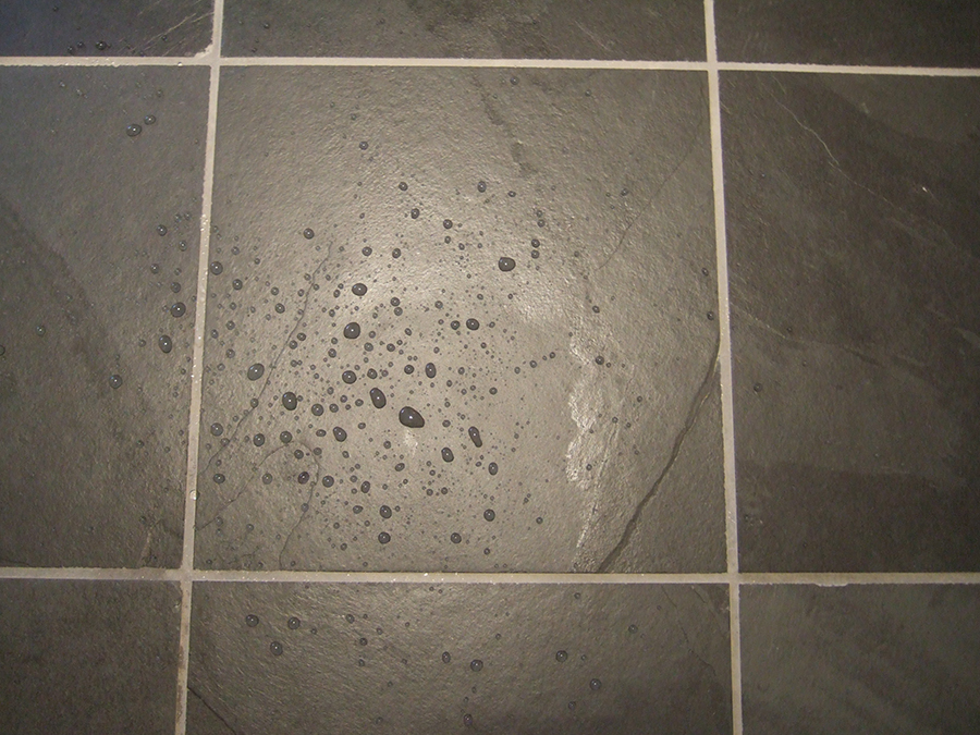 Waterproof  sealer on slate floor tiles