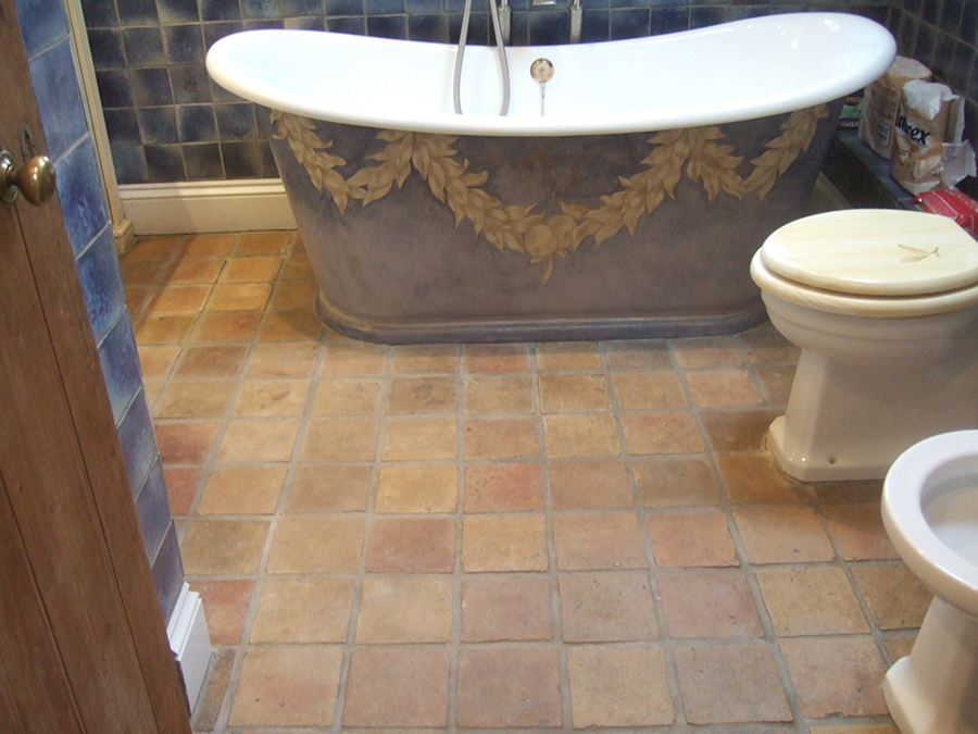 Terracotta tiles in bathroom water marking