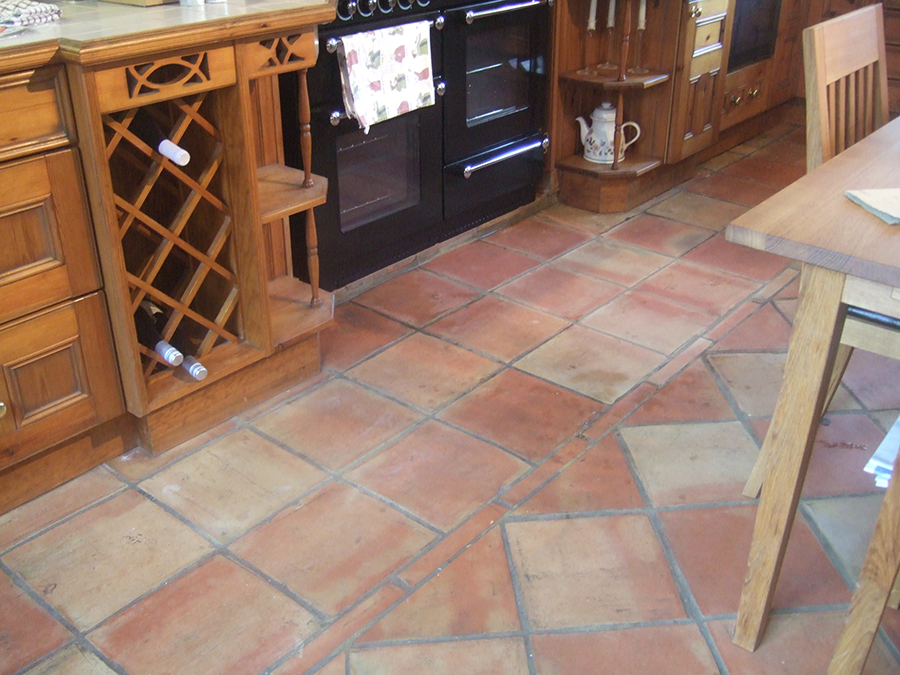 Terracotta floor with grease stains