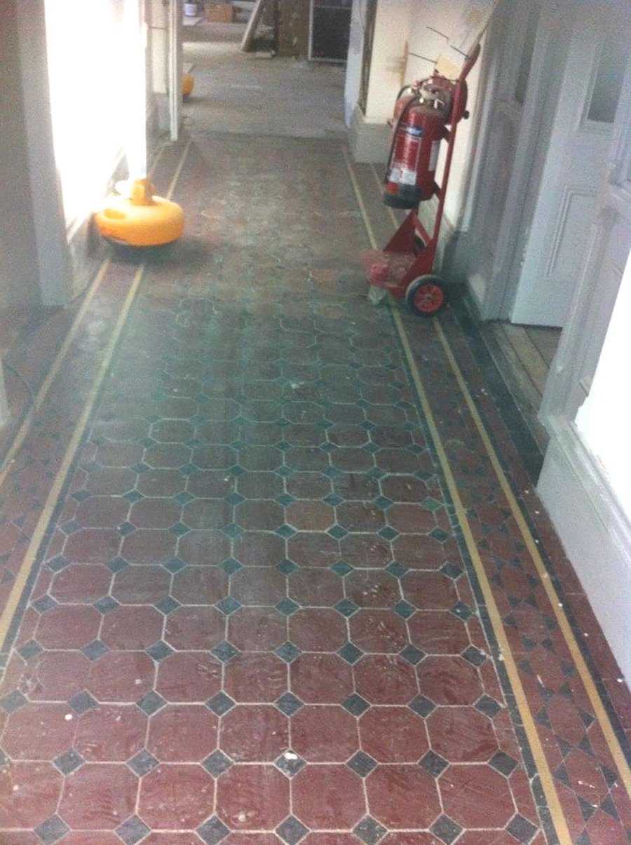 Stained and damaged Victorian tiles