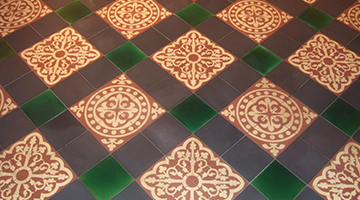 Example photo of a restored geometric Victorian quarry floor tiles.