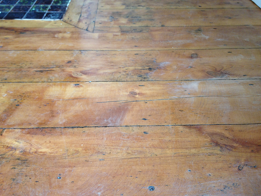 Pine wood floor scratched and damaged