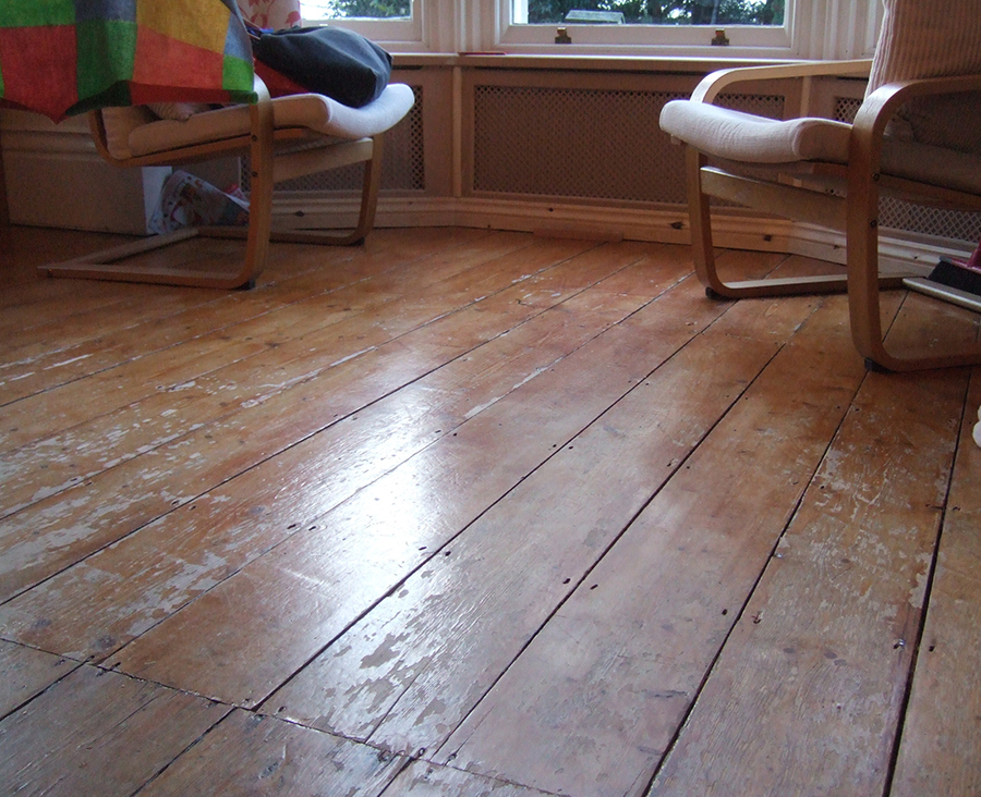 Pine floor boards before sanding